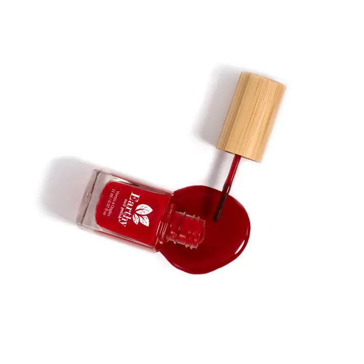 Frasco con muestra de gota del esmalte de uñas sin toxicos para uñas rojas Pasión, profesionales, naturales y brillantes de Mother Nailture